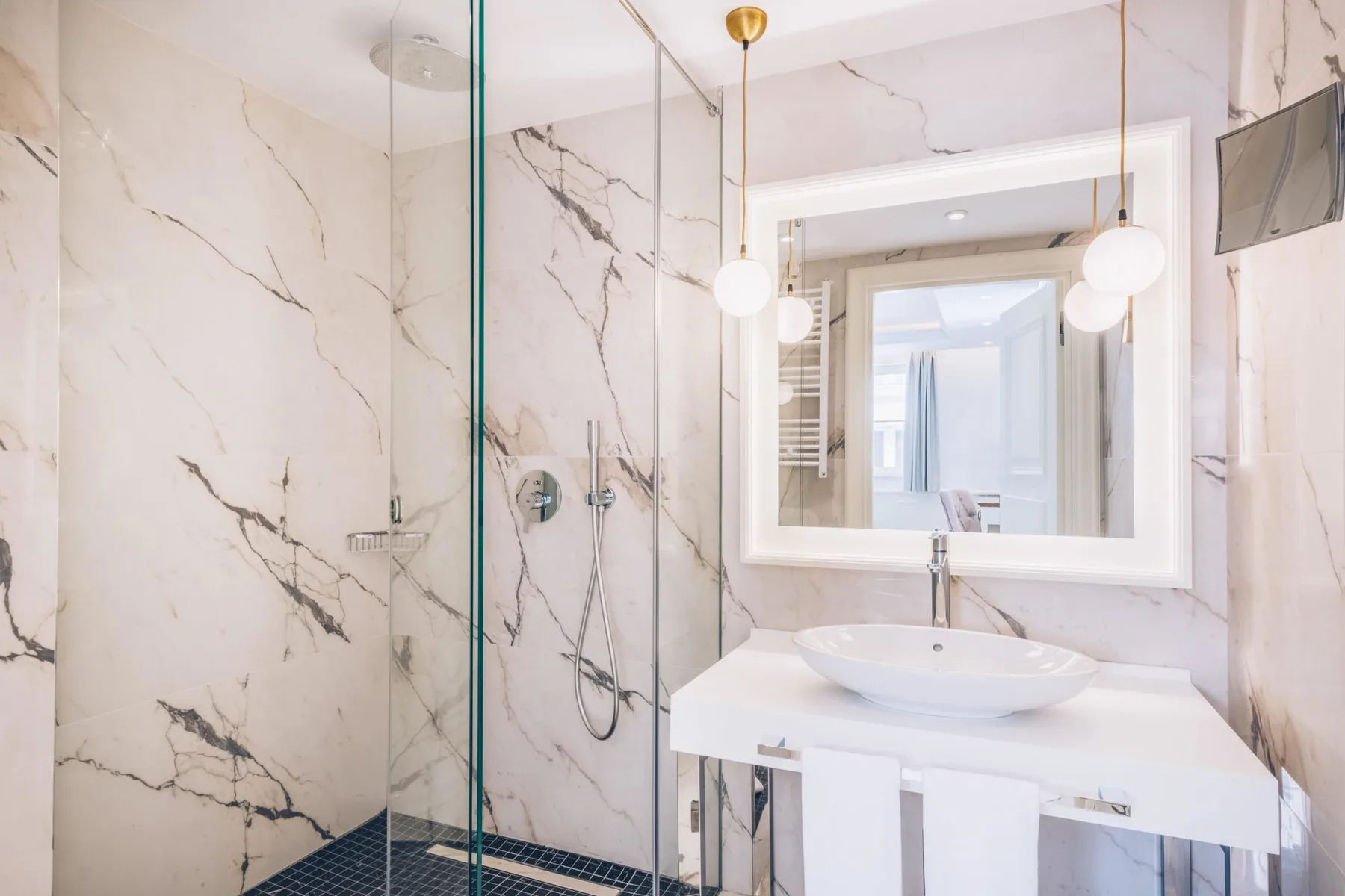 Shower and sink with a mirror