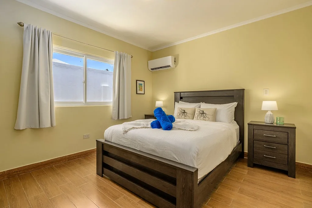 Your bright, peaceful retreat awaits. Sink into plush bedding with perfectly fluffed towels ready on the bed, and drift off under the gentle hum of climate control.