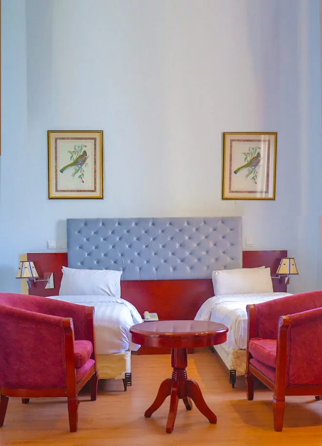 Habitación con dos camas individuales en Tizeze Hotel and Spa