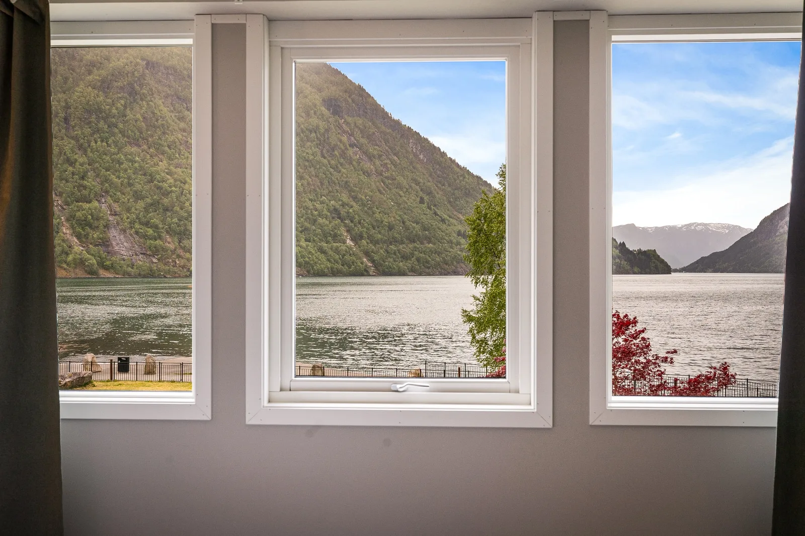 Actual view through the window of a fjord-view room at Sogn Hotel