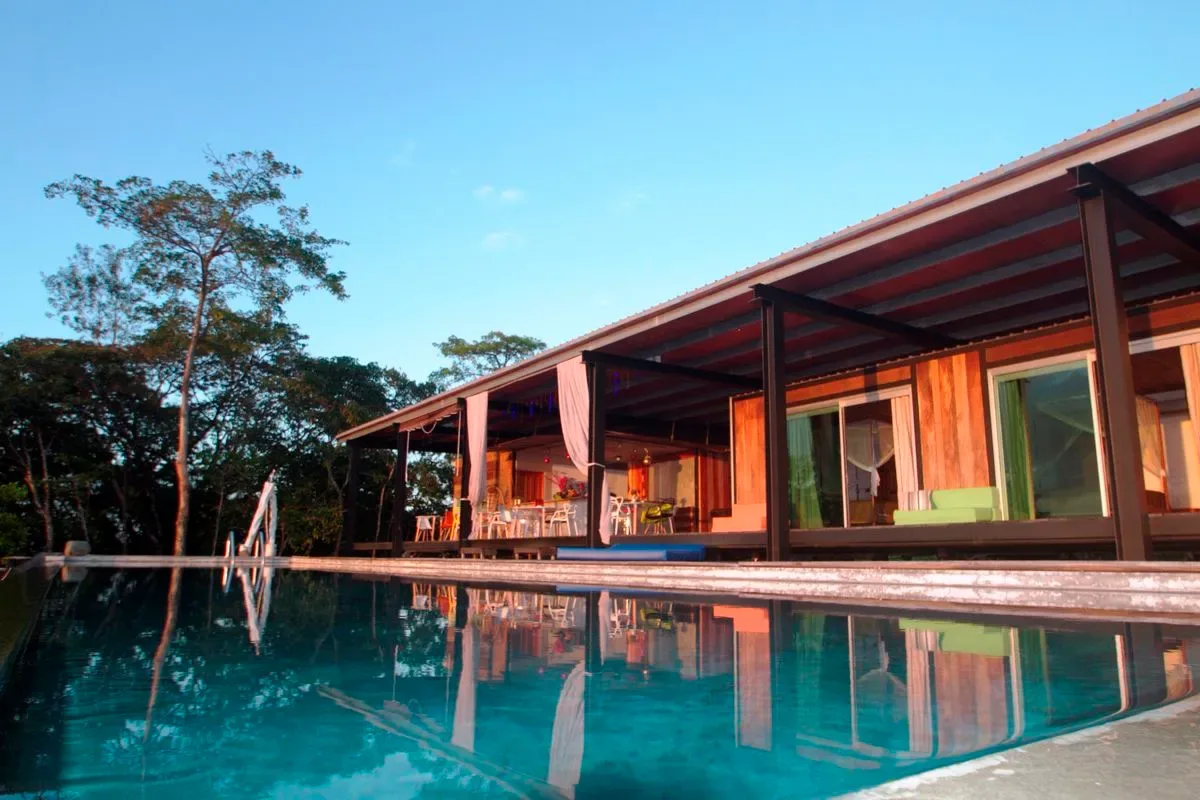 Main house reflected in the pool