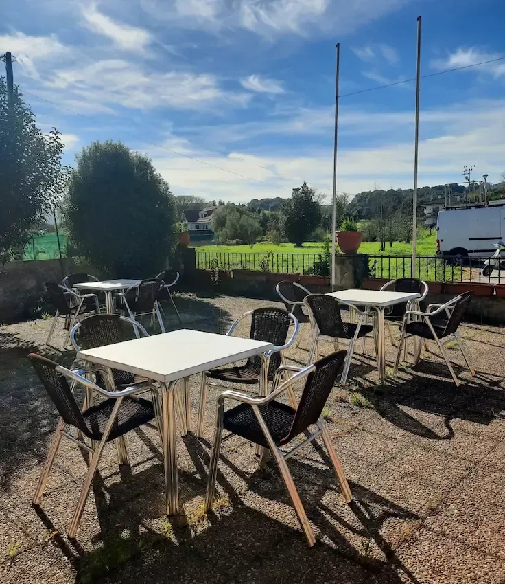 Outdoor terrace and surrounding meadow
