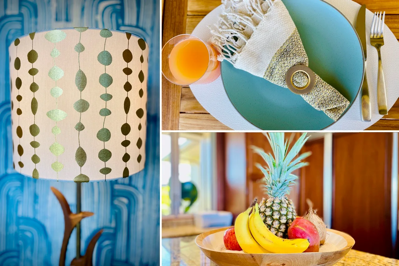 Una mesa puesta con servilletas dobladas aparece sobre un frutero junto a una lámpara estampada.
