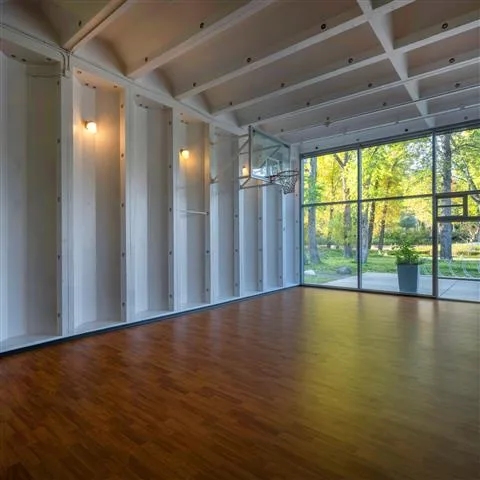 Indoor half-court basketball gymnasium