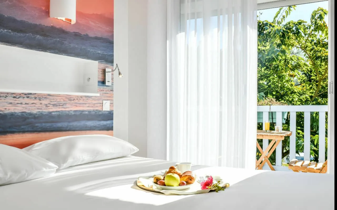 Habitación superior con balcón