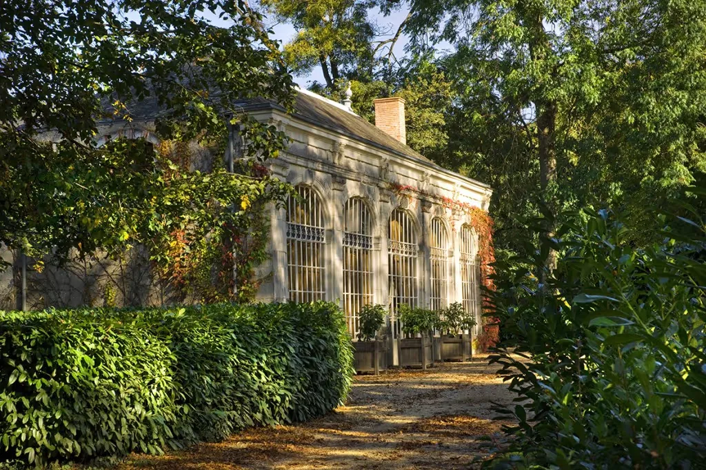 Stone building amid greenery