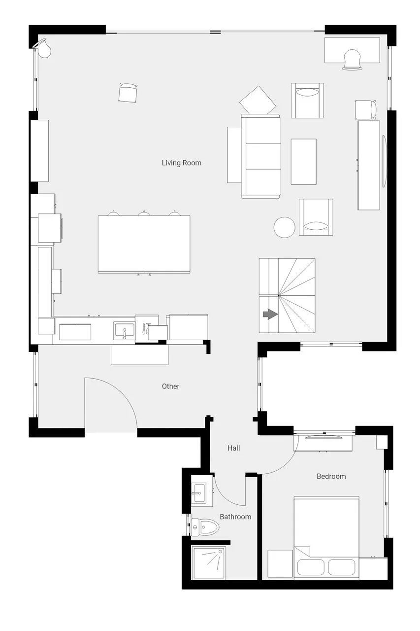 Un plano muestra una sala de estar, una escalera, un baño y un dormitorio.