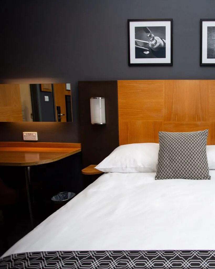 Hotel room with a bed and desk