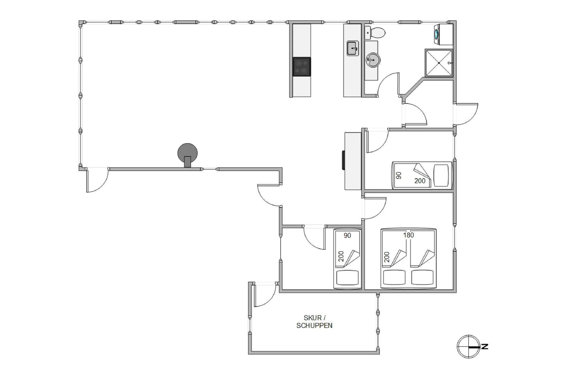 Un plano muestra la distribución de una pequeña construcción con varias habitaciones.