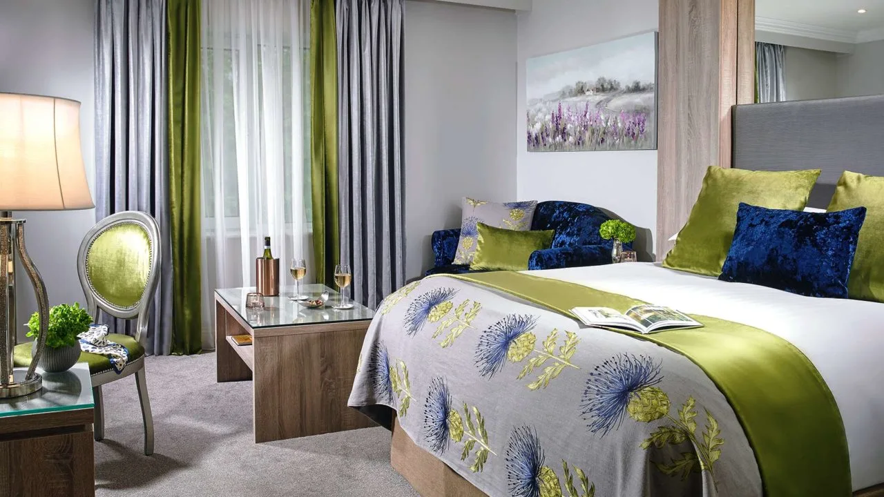 Guest bedroom; the hotel offers double, twin, family, business and accessible rooms, suites and a bridal suite.