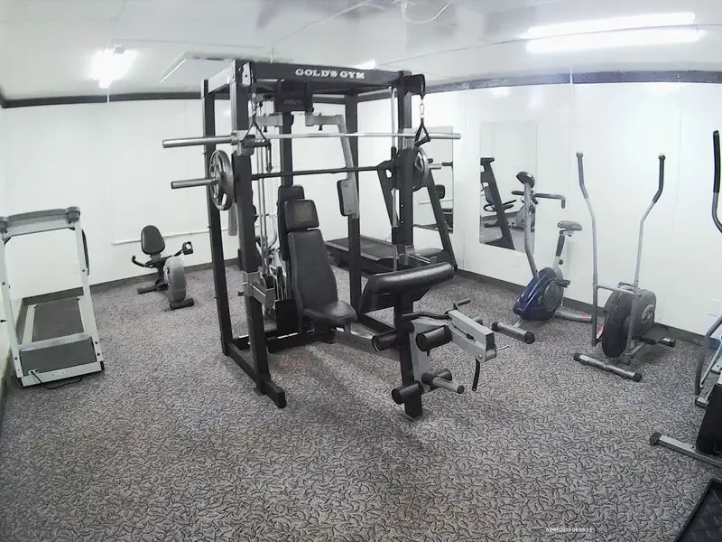 Sala de fitness y equipos de ejercicio dentro del Rycroft Hotel