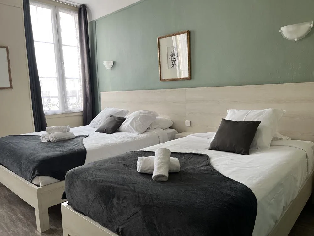Habitación con dos camas individuales