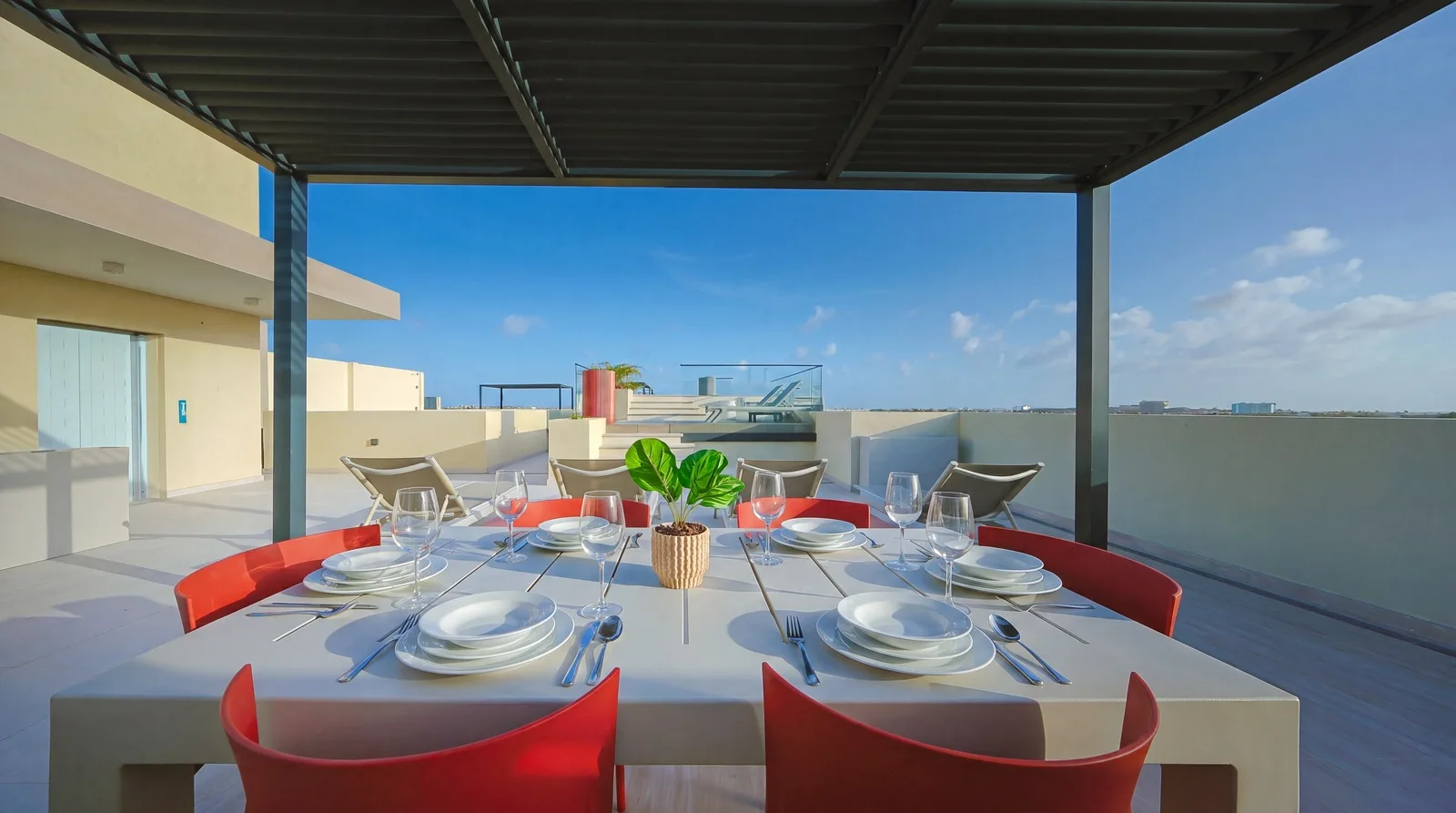 This rooftop terrace provides a stunning setting for al fresco dining, featuring modern furnishings and sweeping views of the surrounding area—perfect for enjoying your morning coffee or a sunset dinner.