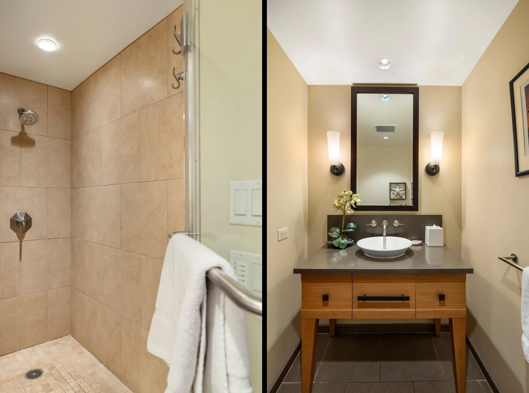 Un baño con una ducha revestida de azulejos y un tocador con lavabo y espejo.