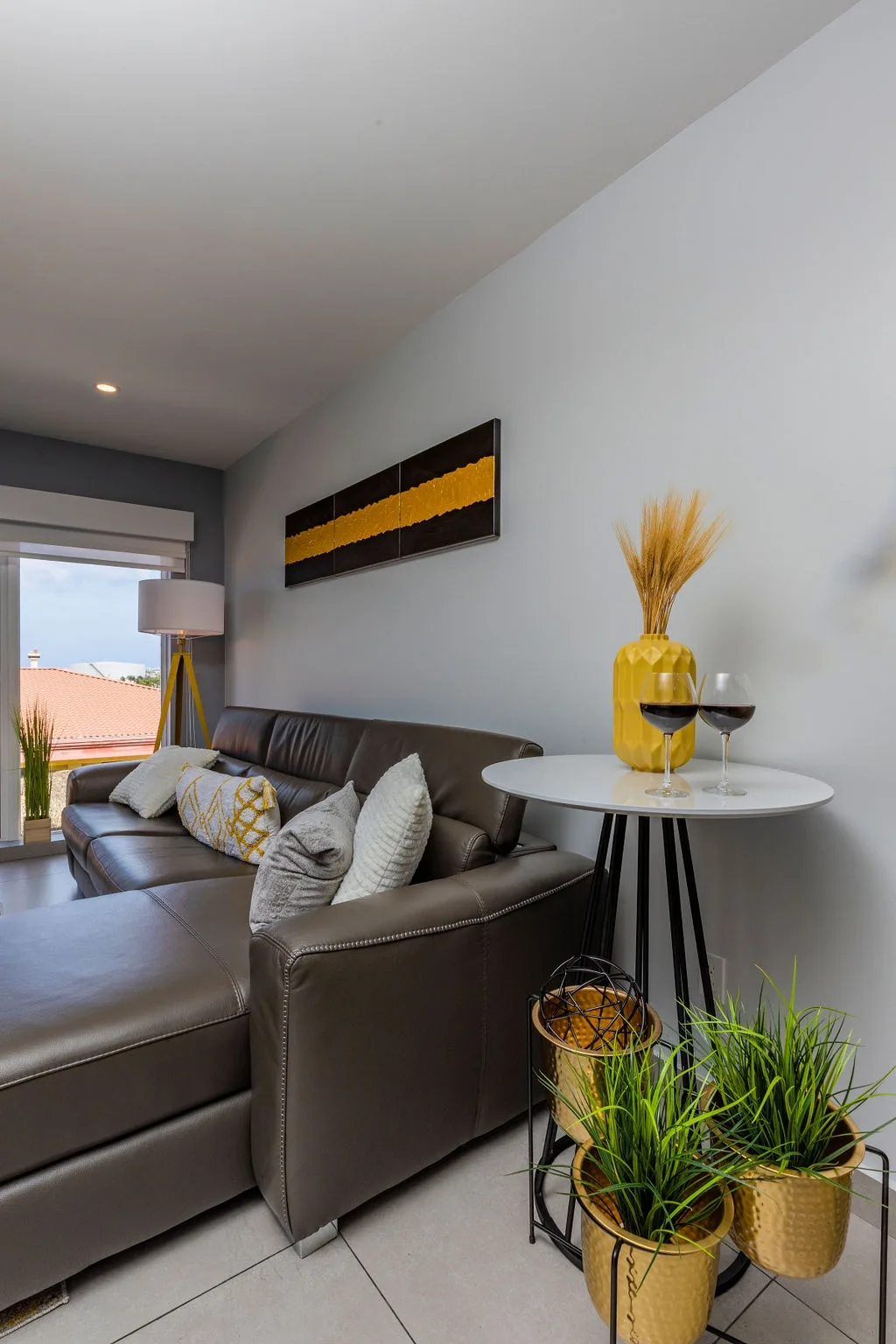 Sink into this plush leather sofa with your favorite wine and let the golden accents and natural light wrap you in warmth. A perfect retreat for unwinding after exploring the area.