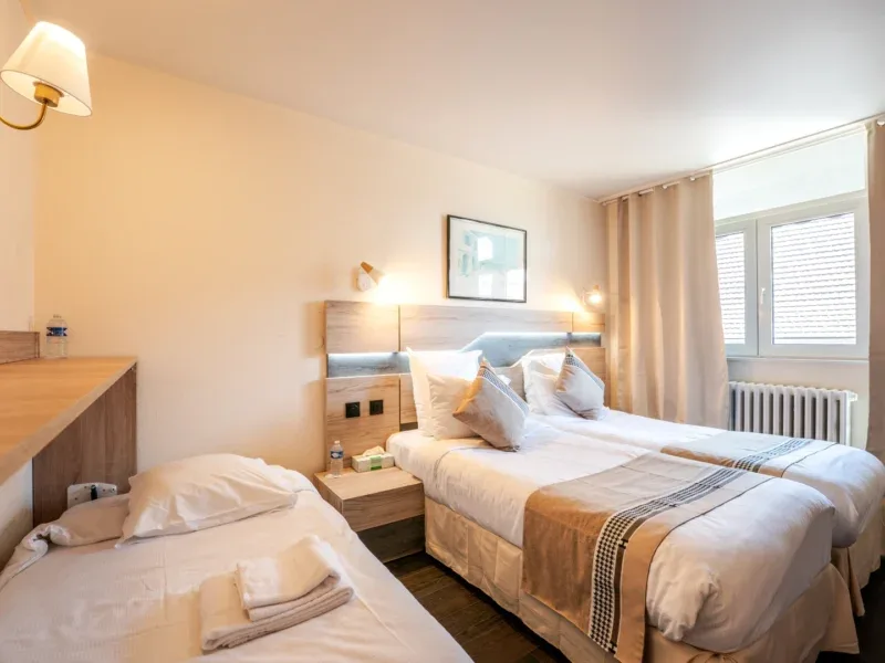 Habitación de hotel para tres personas