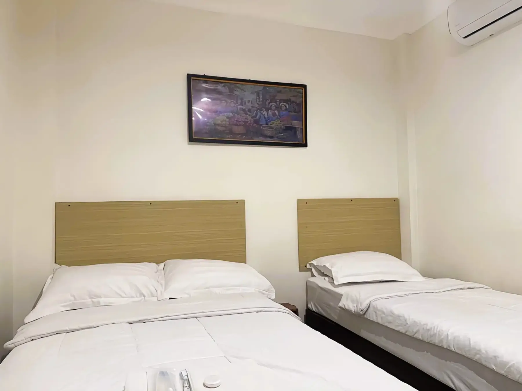 Habitación triple deluxe con vistas al jardín