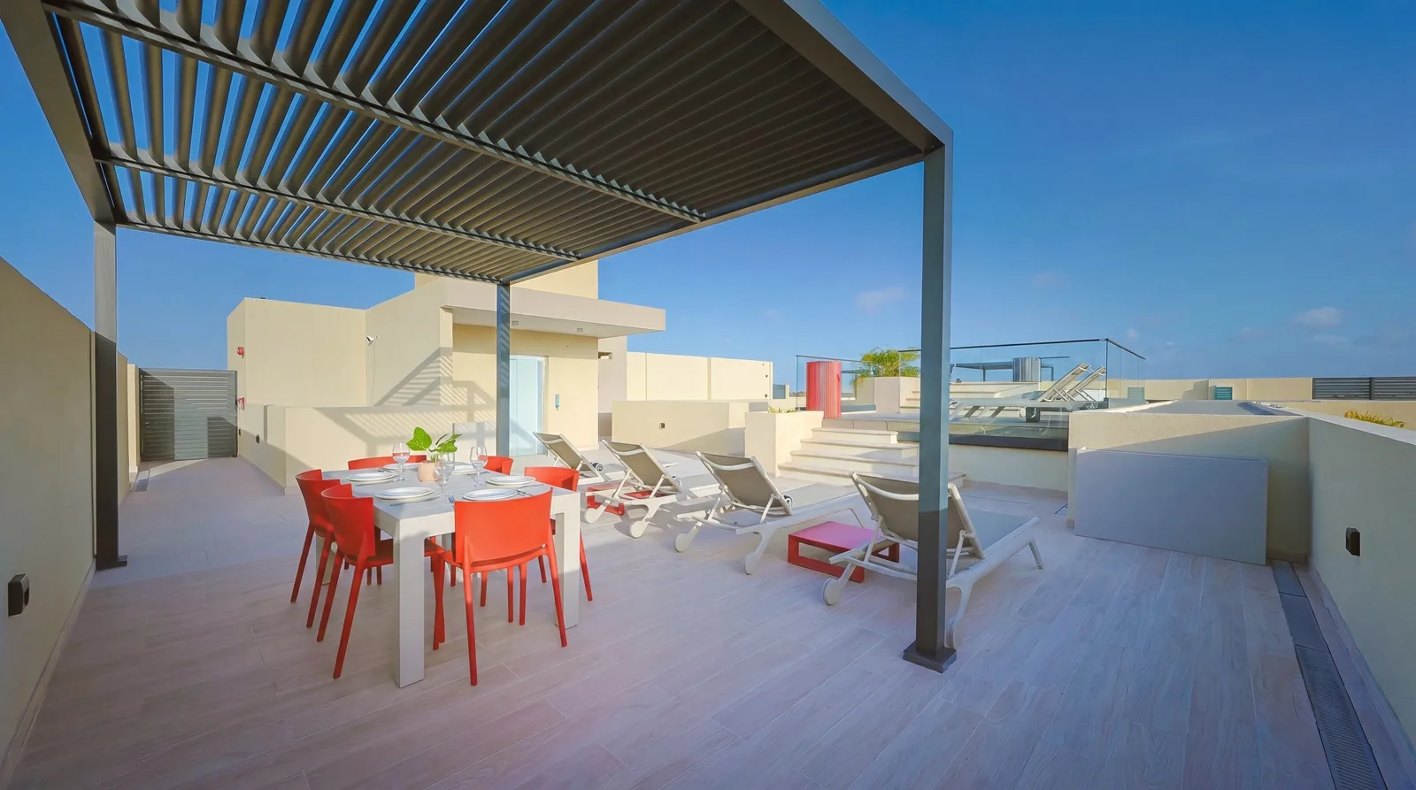 Dine al fresco beneath the pergola