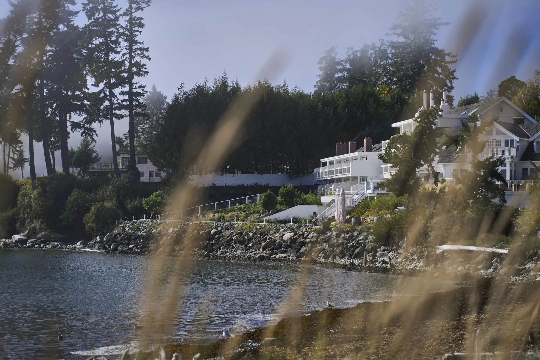 Sooke Harbour House exterior, viewed from the beach.