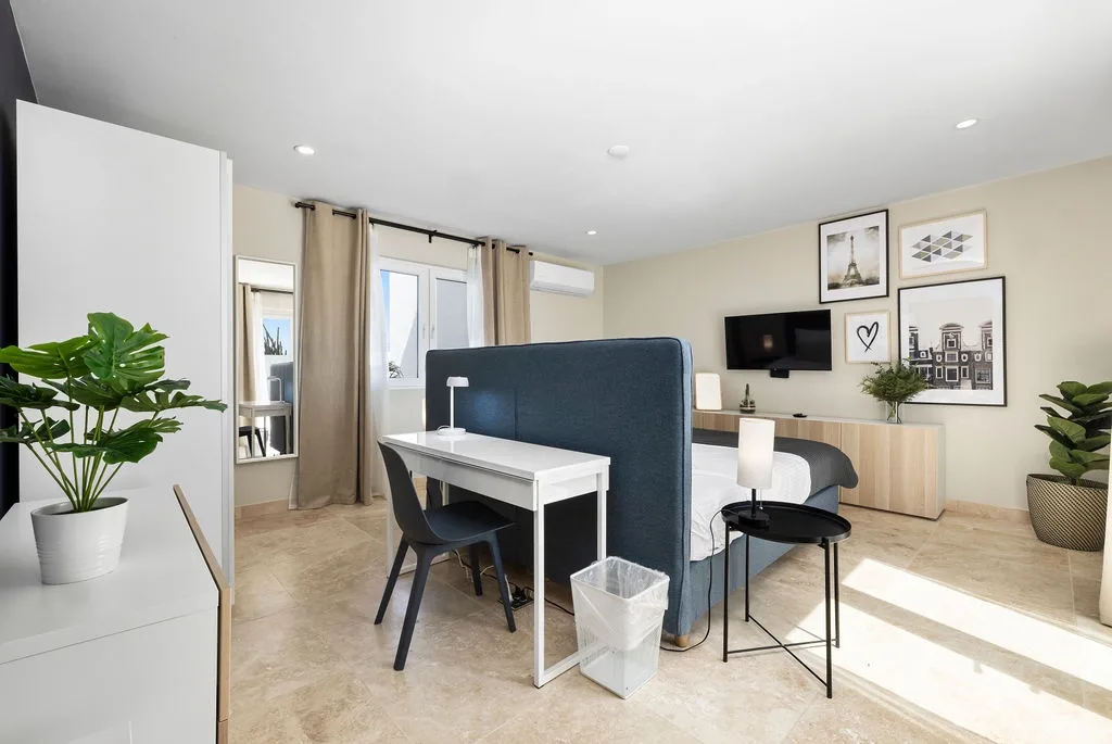 Your bright, contemporary workspace invites productivity with stylish furnishings, natural light, and personal touches—perfect for catching up on work or planning your next adventure.