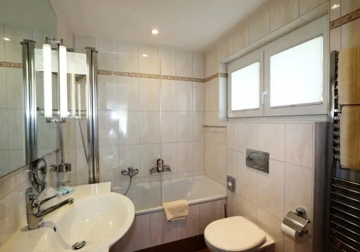 Bathroom with shower, sink, toilet and bathtub.