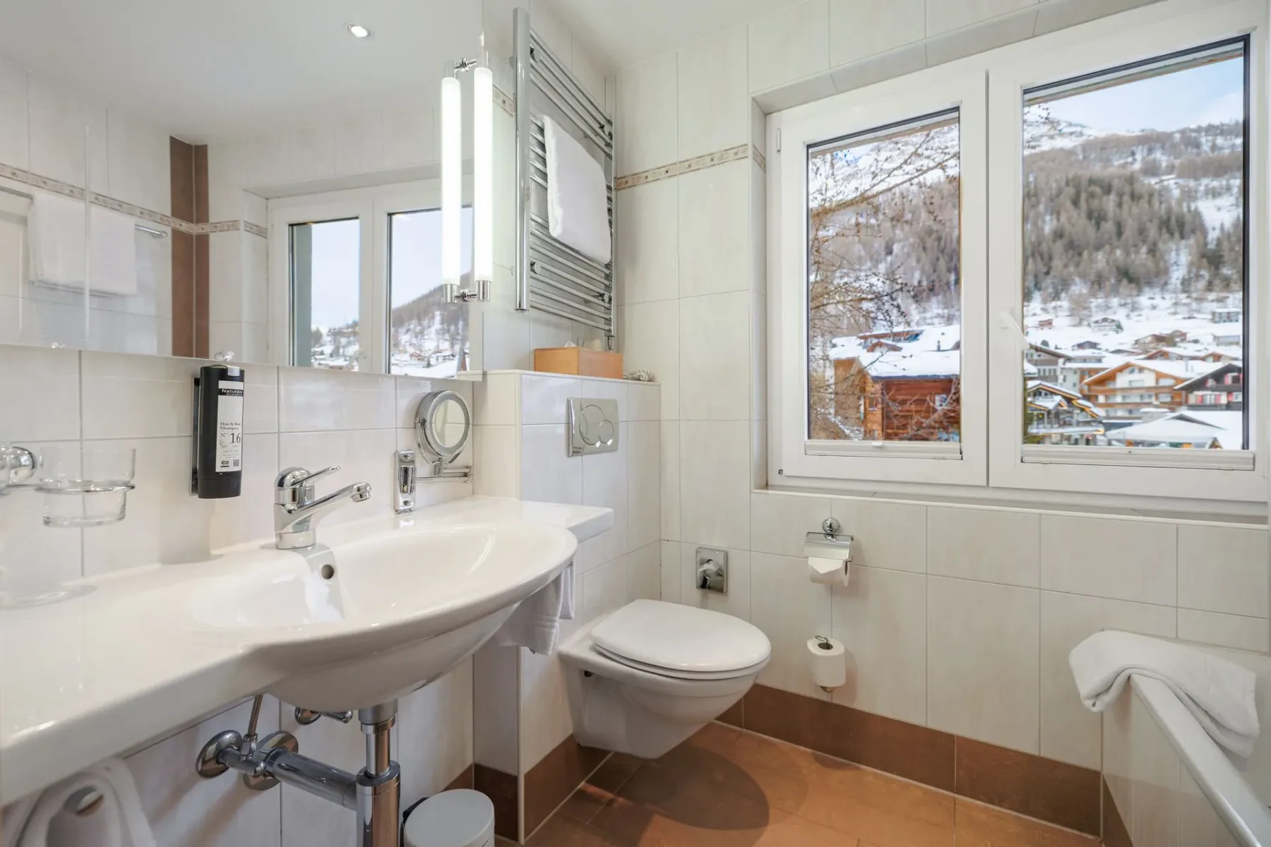 Bathroom with sink and toilet.