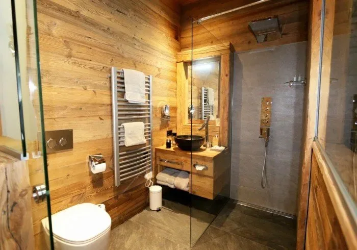 Bathroom with glass shower and sink.