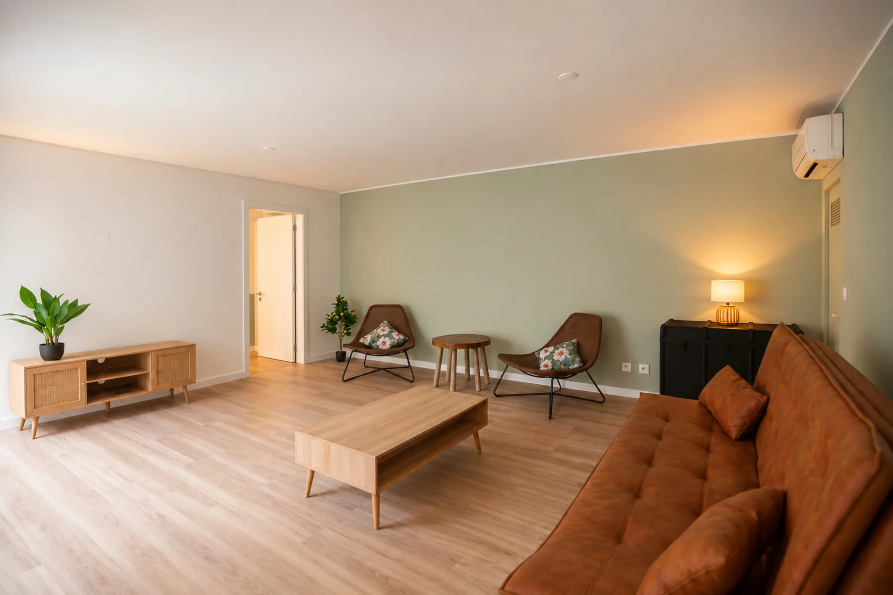 A living room with a low table and seating along the wall.