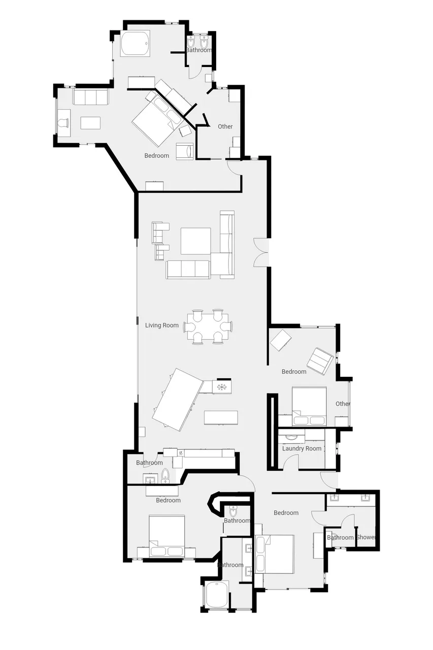 Un plano muestra una sala de estar, dormitorios, baños y una cocina.