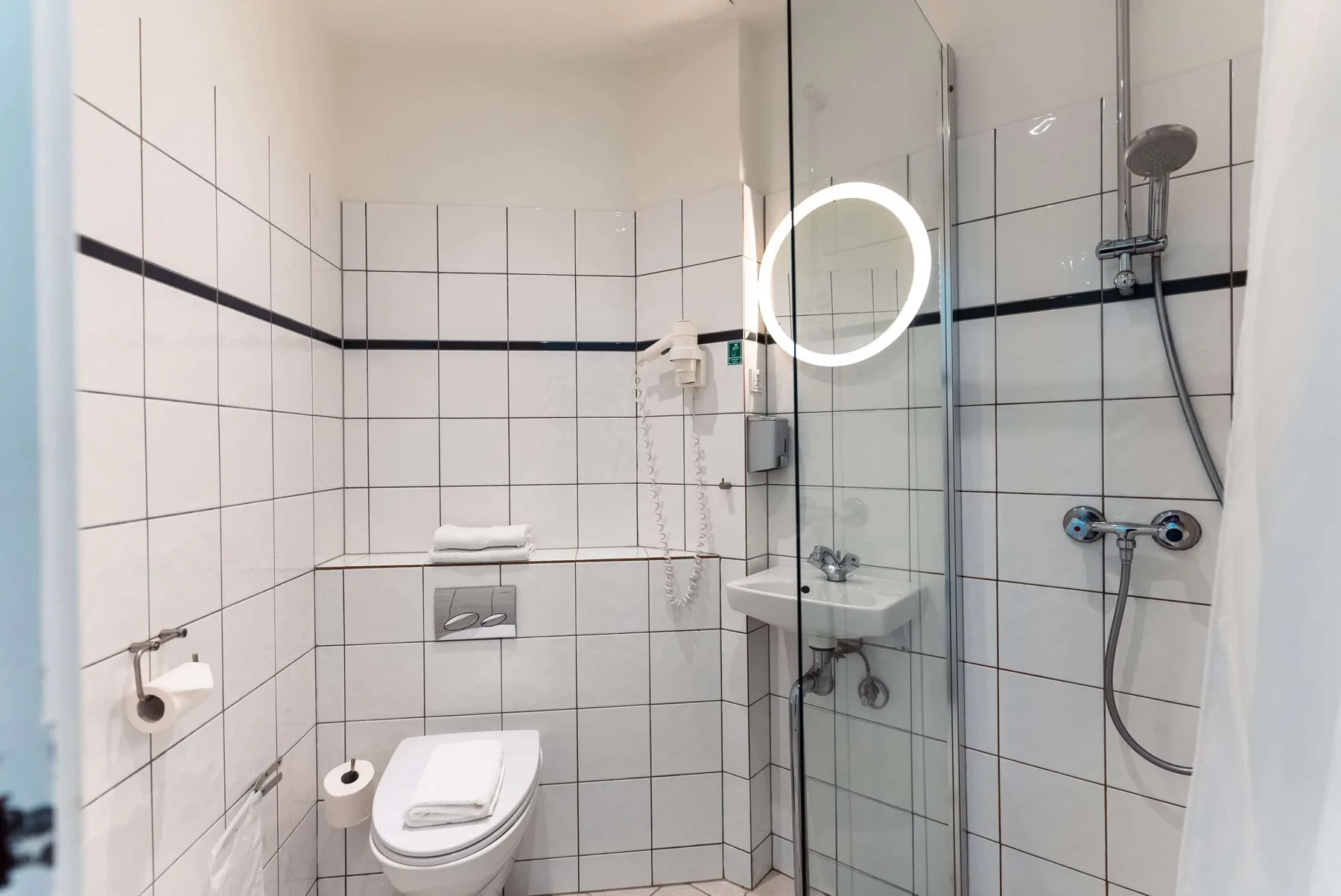 Bathroom with shower and toilet.