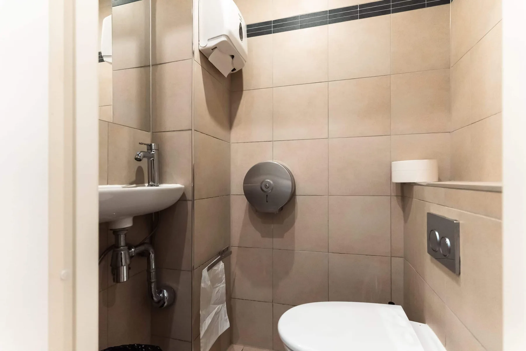 Bathroom with toilet and sink.