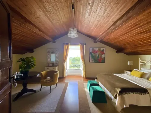 Charming Suite bedroom and sitting area
