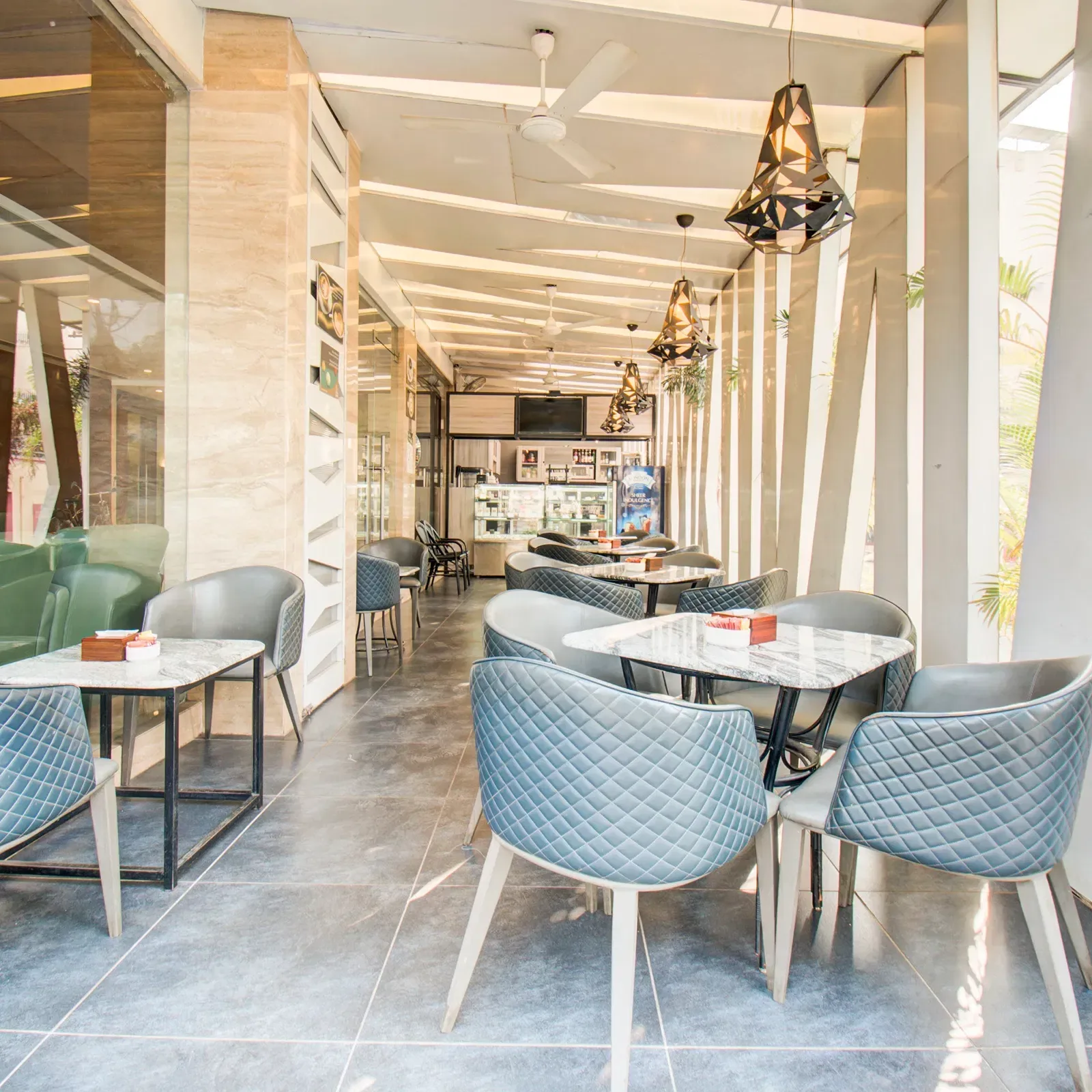 Zona de estar al aire libre en Le Cafetino