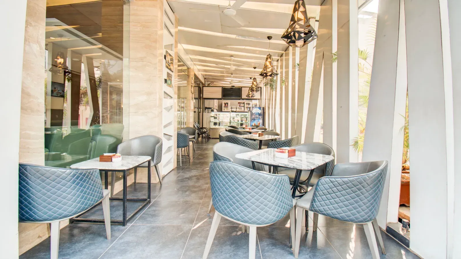 Zona de estar al aire libre en Le Cafetino