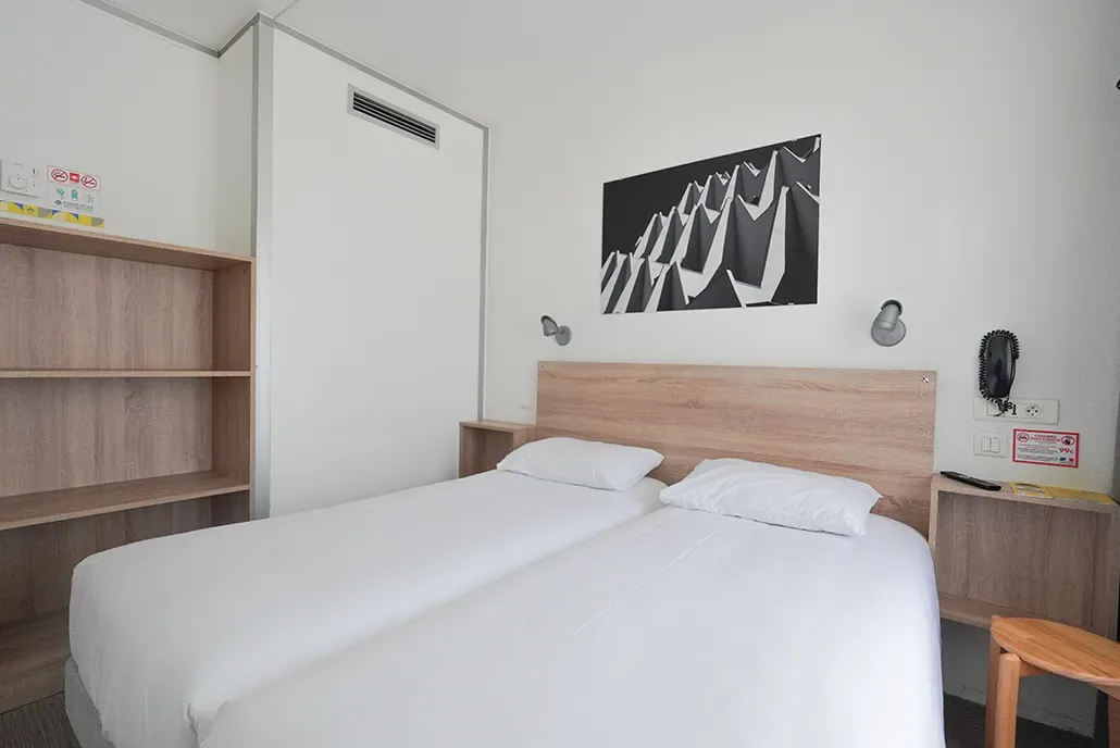 Habitación con dos camas individuales