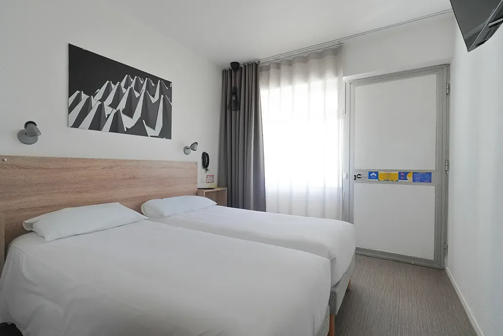 Habitación con dos camas individuales