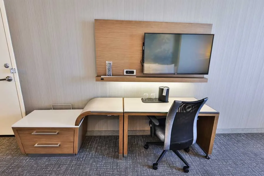 Desk and workspace in a standard two-queen room