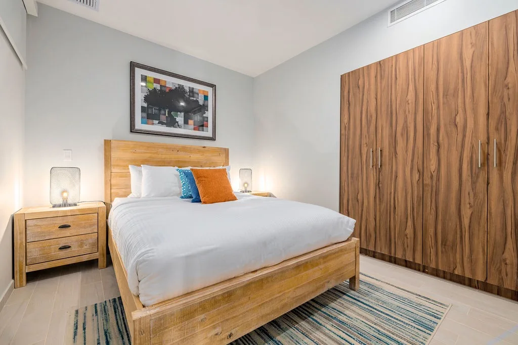 Your stylish bedroom offers clean lines, modern art, and ample storage for complete comfort.