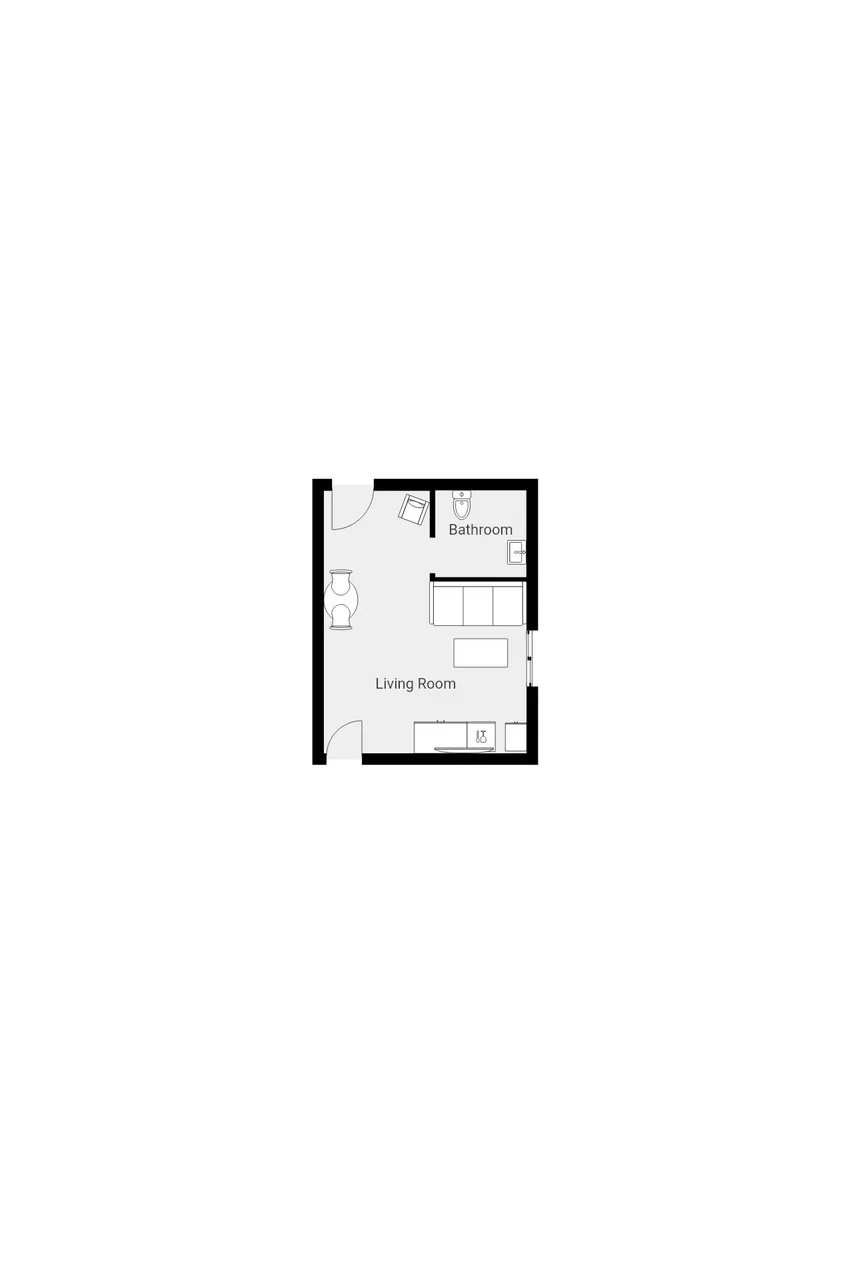 Un plano de planta que muestra una sala de estar y un baño.