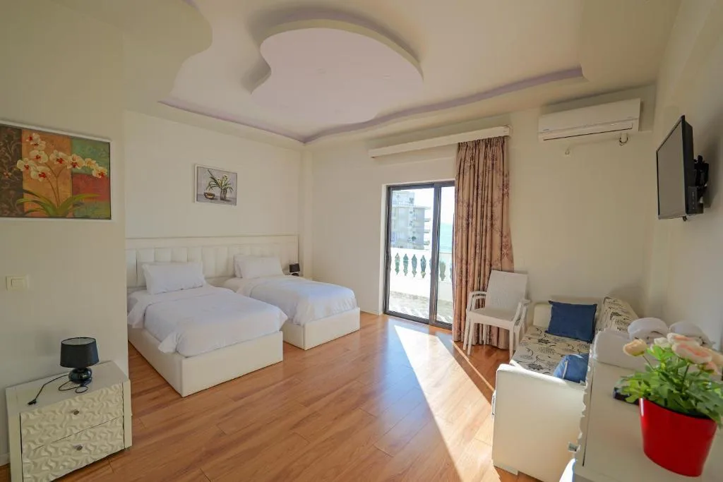 Habitación deluxe con cama doble o 2 camas individuales y vistas al mar