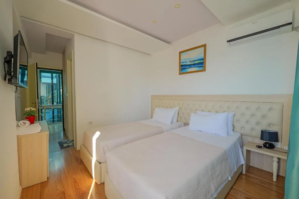 Habitación con cama doble o 2 camas individuales y balcón