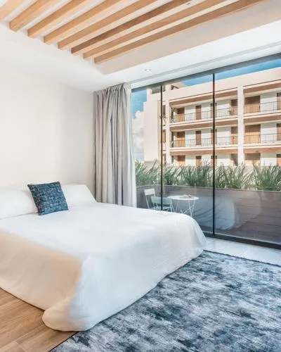 Junior Suite with Balcony and Pool View