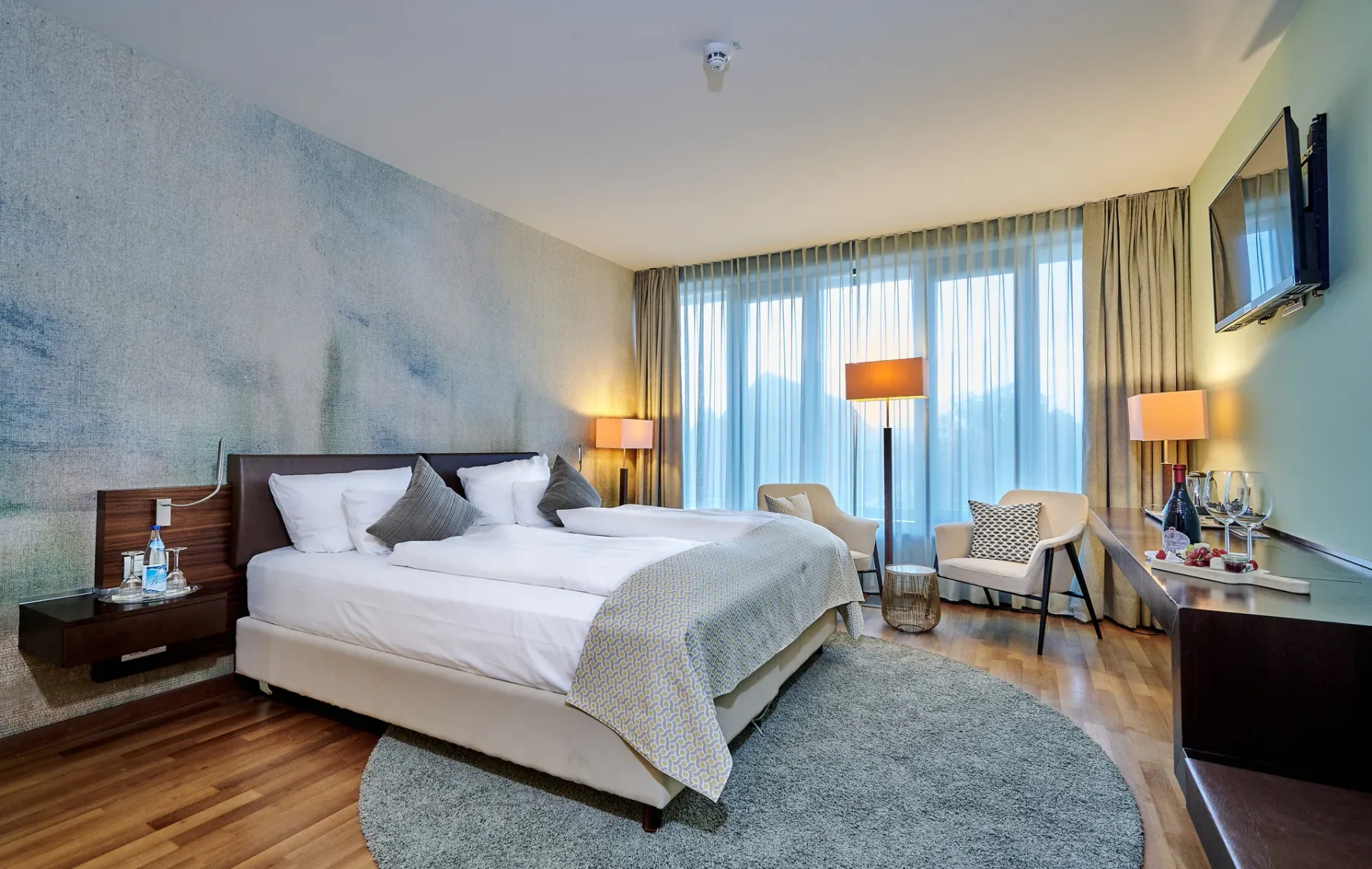 Bedroom with a balcony frontage
