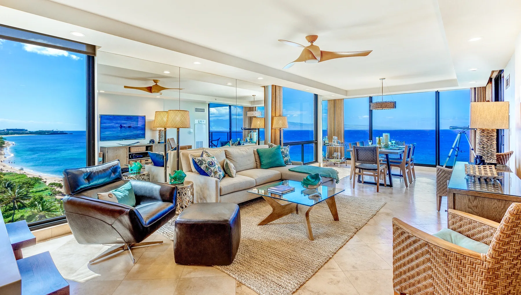 A bright living and dining area opens onto expansive ocean views.