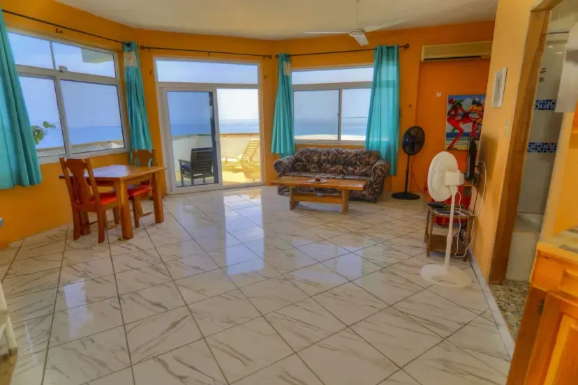 Sala de estar y comedor en la suite del propietario, habitación 17