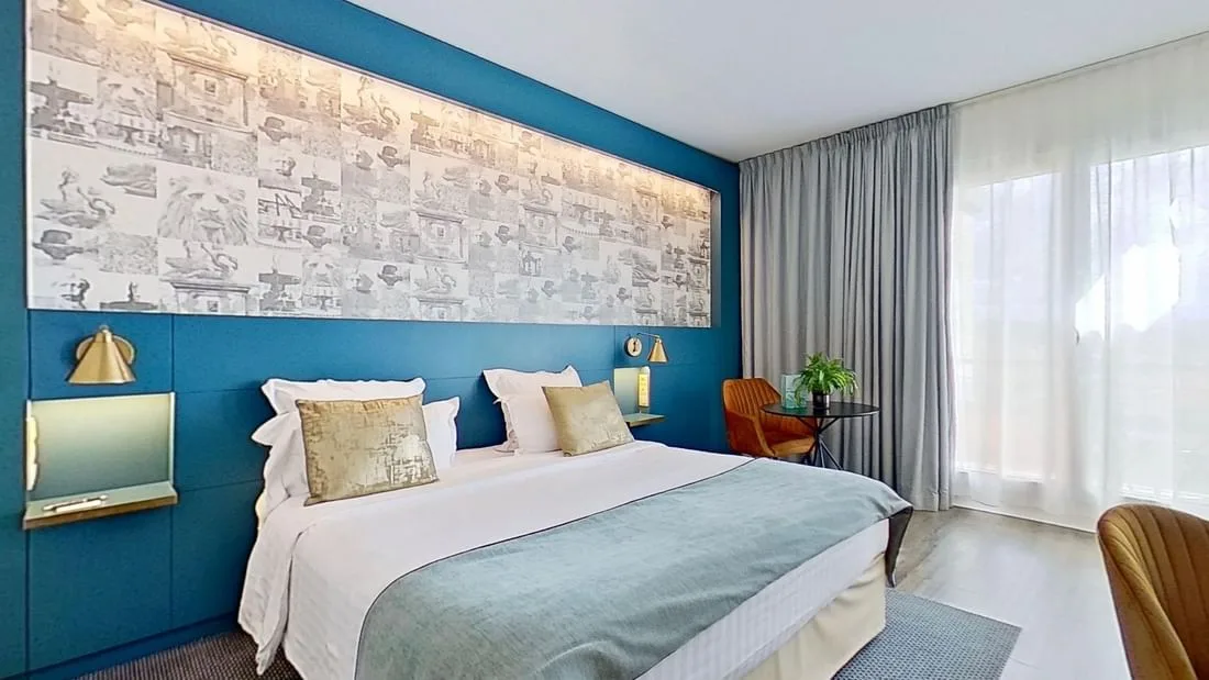 Guest room with bed and seating