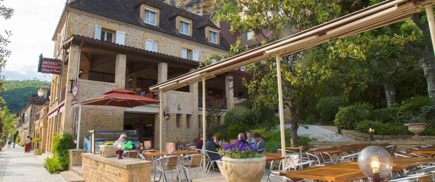 Hotel terrace overlooking the park and Dordogne
