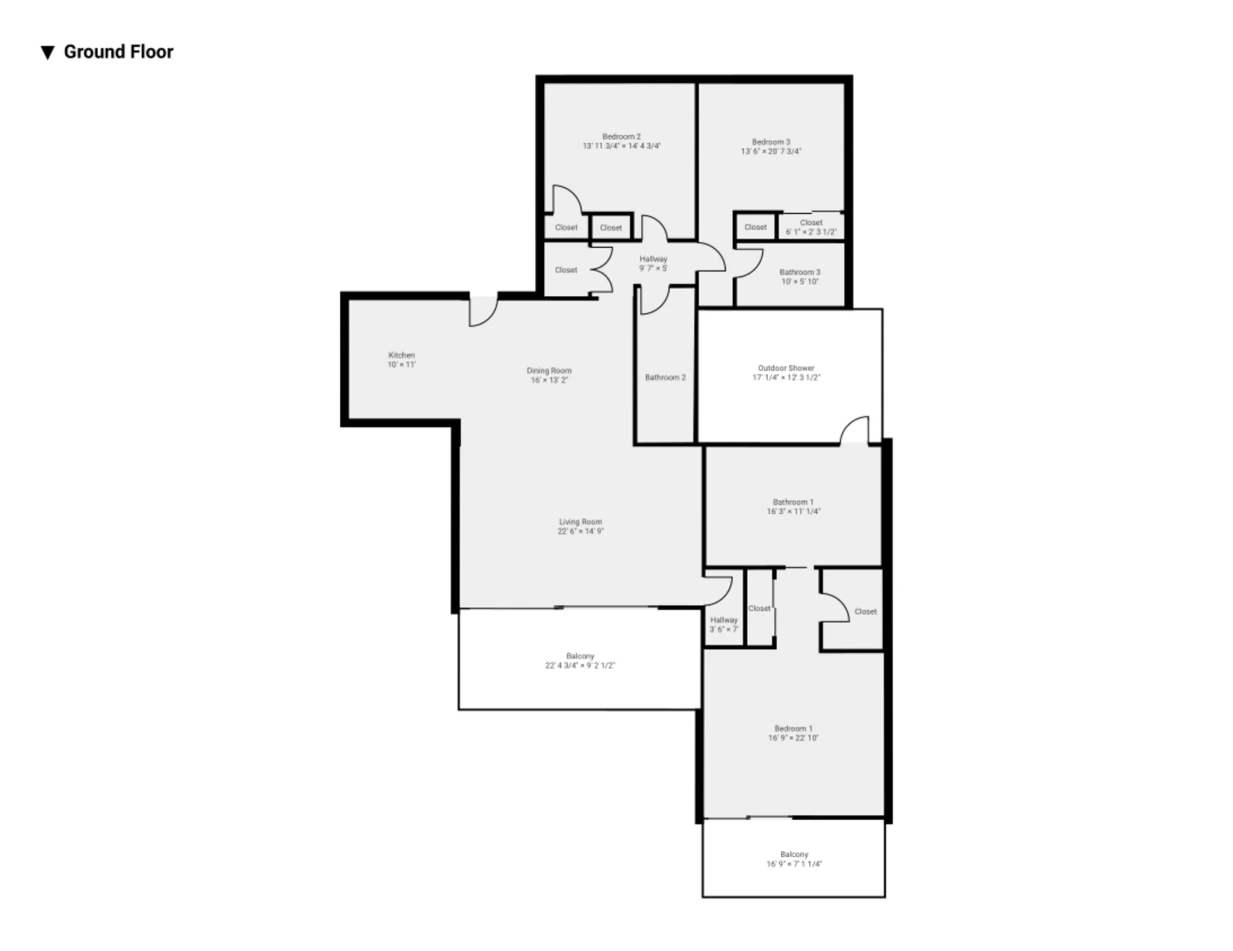 Ground-floor house plan showing bedrooms, bathrooms, and a living area.