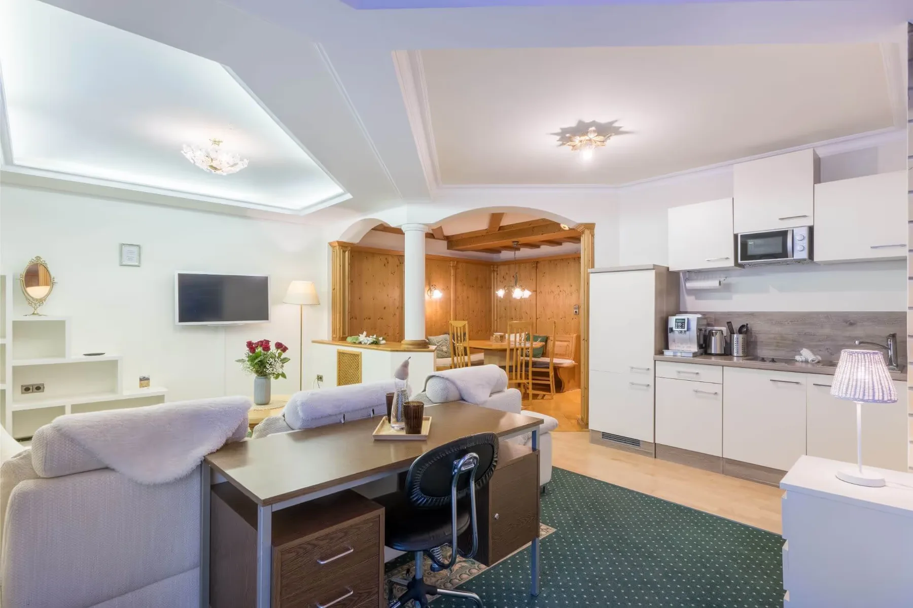 Holiday apartment living area and kitchen