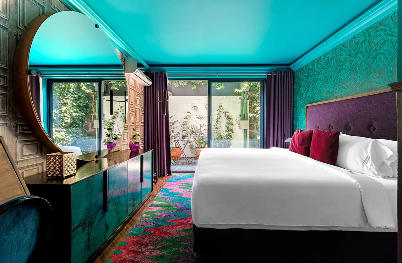 Cama de la habitación Junior Suite en Pug Seal Anatole France, Polanco